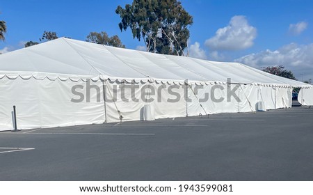 An extra large white tent for commercial events of emergency disaster relief.