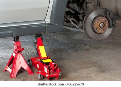 Extra safety measures are taken  by using a hydraulic jack and jack stand to lift up a vehicle.