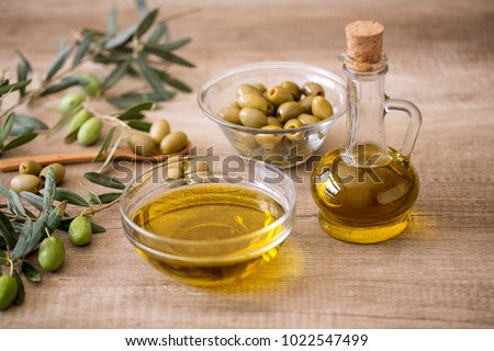 Extra virgin healthy Olive oil with fresh olive on wooden background
 Zdjęcia stock © 