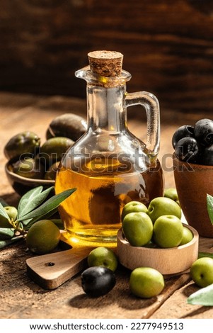 extra virgin olive oil in glass bottles on a wooden background. Healthy and detox food concept. place for text. Zdjęcia stock © 