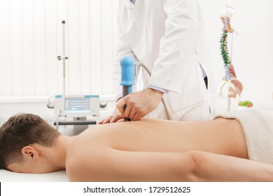 Extracorporeal Shockwave Therapy ESWT.Non-surgical treatment.Physical therapy for neck and back muscles,spine with shock waves.Pain relief, normalization and regeneration,stimulation healing process.