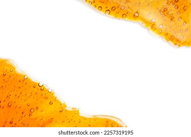 extract of gold cannabis wax with high thc, bubble shatter with place for text copy space.