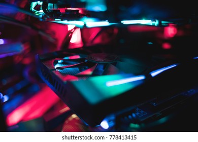 Extraction of bitcoin. Glowing video card close-up. Frame for mining bitcoin. Frame for video cards. Many video cards. Bitcoin mining. - Shutterstock ID 778413415