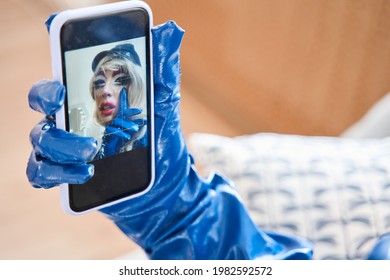 Extravagant Drag Queen With Creative Makeup Making Selfie