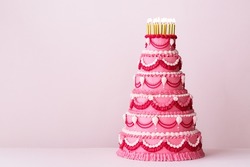 Extravagant Pink Tiered Birthday Cake Decorated With Vintage Buttercream Piped Frills And Gold Birthday Candles
