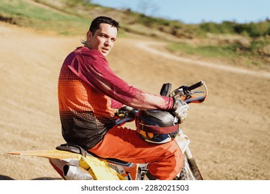 Extreme and Adrenaline. Motocross rider close up portrait. Motocross sport. Active lifestyle.