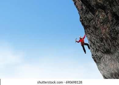 Extreme climbing is his adrenaline . Mixed media - Shutterstock ID 690698128