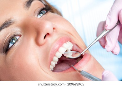 Extreme Close Up Of Beautiful Young Girl Having Dental Check Up.