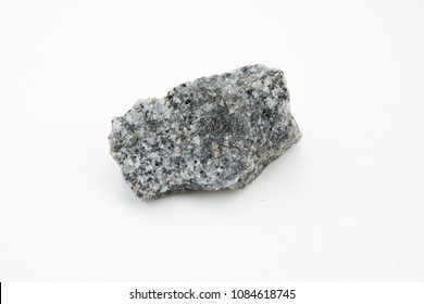 Extreme Close Up With A Lot Of Details Of Quartz Diorite Mineral Isolated Over White Background