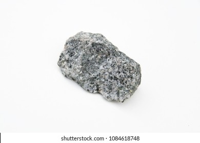 Extreme Close Up With A Lot Of Details Of Quartz Diorite Mineral Isolated Over White Background