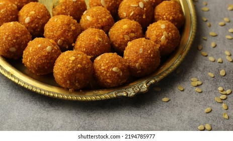Extreme close up of Motichoor Laddu or Laddoo is served on Authentic brass plate. (Ganesh Chaturthi Food concept)  - Shutterstock ID 2194785977