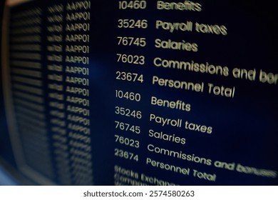 Extreme close up on computer screen displaying orange lines of coding program on black background, fish eye effect