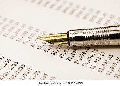 Extreme Close Up Shot Of Pen On Money Table