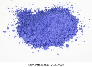 Extreme Close Up Of Ultramarine Pigment Isolated Over White Background