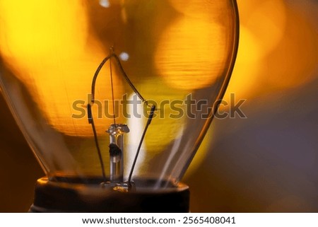 Extreme close up view of Incandescent light bulb with lighting.