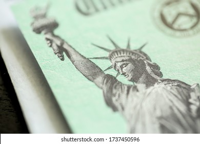 Extreme Close-up Of Federal Coronavirus Stimulus Check Provided To All Americans From The United States Treasury In 2020, Showing The Statue Of Liberty. 