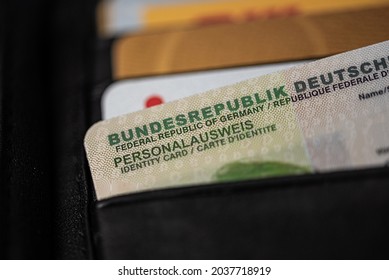 Extreme Close-up Of German ID Card In Black Leather Wallet