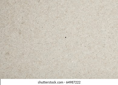 extreme closeup of a grey cardboard texture