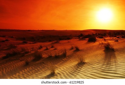 Extreme Desert Landscape With Orange Sunset