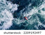 Extreme kayak boat rough river aerial top view, sunny day. Concept travel rafting adrenaline.