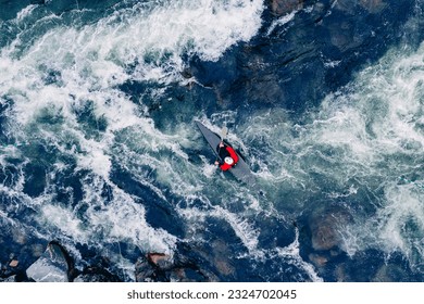 Extreme kayak boat rough river aerial top view, sunny day. Concept travel rafting adrenaline. - Powered by Shutterstock