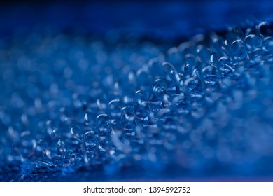 extreme macro of a blue velcro texture, abstract background
