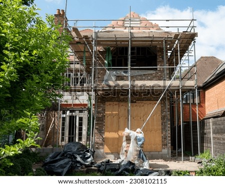 Extreme makeover of an Edwardian suburban house in Pinner, north west London, UK