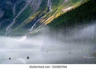 Extreme Morning Fog And Mist On A Summer Day At Avalanche Lake In Glacier National Park