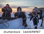 The extreme north, Yamal, the past of Nenets people, the dwelling of the peoples of the north, a family photo near the yurt in the tundra