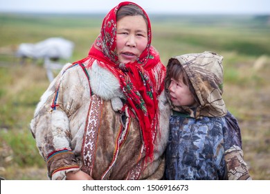 The extreme north, Yamal, the past of Nenets people, the dwelling of the peoples of the north, a family photo near the yurt in the tundra