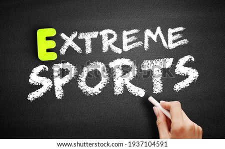 Extreme sports text on blackboard, sport concept
