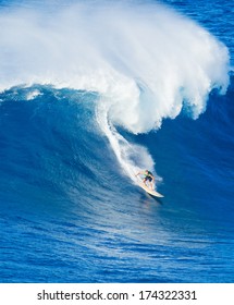 Extreme Surfer Riding Giant Ocean Wave In Hawaii