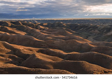 Extreme Terrain Of Kazakhstan With Full Moon Rising.