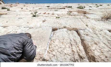 An Extreme Wide Angle Of The Wailing Wall (western Wall) Upwards With A Man Praying While His Back To The Camera, Jerusalem, Israel.