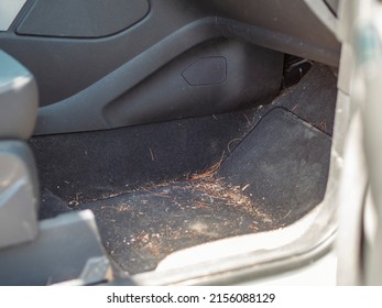 Extremely Dirty Car Interior With Sand On The Floor. Car Before Detailing And Carwash Concept