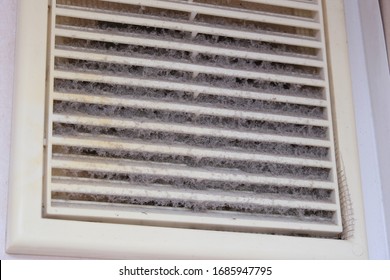 Extremely Dirty And Dusty White Plastic Ventilation Air Grille At Home Close Up, Harmful For Health, House Cleaning Concept..