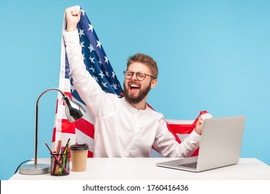 Extremely Happy Businessman Raising American Flag And Yelling Crazy For Joy In Office Workplace, Celebrating Labor Day Or US Independence Day 4th Of July, Government Employment Support. Studio Shot