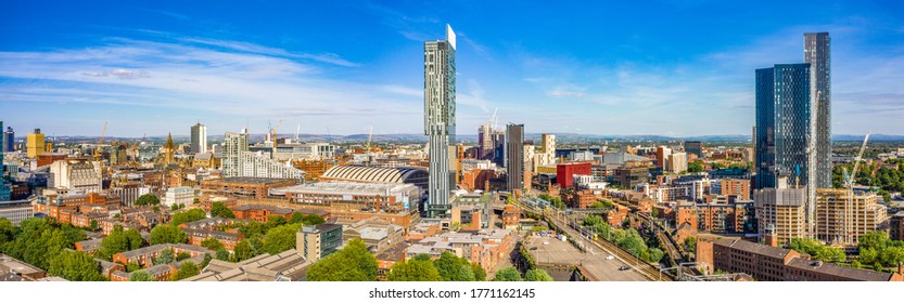 Extremely wide panoramic aerial shot on a beautiful summer day during lock-down in Manchester UK
