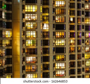 Extrior Of Apartment Building At Night