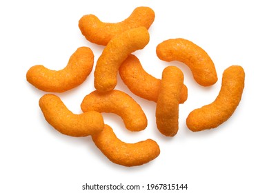 Extruded cheese puffs isolated on white. Top view. - Shutterstock ID 1967815144