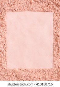 Extruded frame in a foundation cosmetic powder. For background or texture