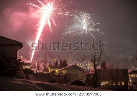 Exuberant Explosions Paint the Sky, Marking a Joyous Scandinavian Celebration Over Drammen, Norway.
