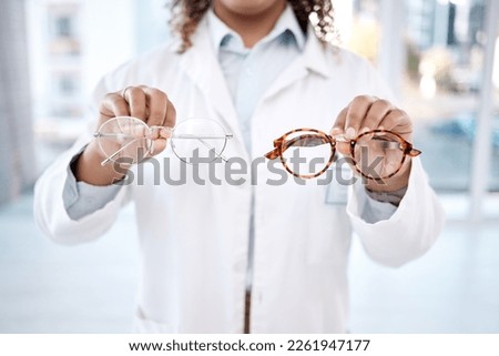 Eye care, vision and woman, choice of glasses in hands, optometrist and healthcare for eyes with doctor. Prescription lens, designer frame and eyewear decision, health insurance and optometry