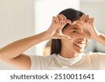 Eye Care. Woman Framing Eye With Heart-Shaped Hands, Symbolizing Love And Positivity, Eye Health.