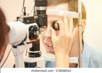 Eye Doctor Diagnostic. Patient At Medical Clinic. Cataract Ophthalmology Exam. Astigmatism Examination. Prevention Eyecare Consultation. Patient Control Glaucoma