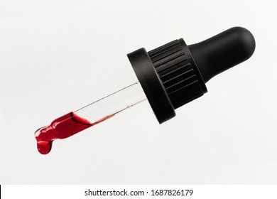 Eye Dropper With Blood Red Liquid And Drop, Isolated On White Background