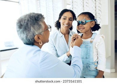 Eye exam, optometry and child with senior woman optometrist at clinic for vision check. Eyesight, glasses and kid consulting old lady ophthalmologist for optics, analysis or prescription spectacles - Powered by Shutterstock