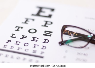 Eye Glasses On Eyesight Test Chart Stock Photo 667755838 | Shutterstock