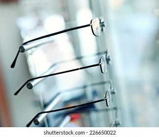 Eye Glasses Shop. Detail From Eye Glasses Shop. Glasses On Blur Background.