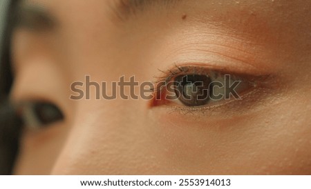 Eye human dark iris macro shot woman beauty female open eyes extreme close-up Asian chinese korean japanese healthy girl clear vision looking blinking eyelashes health eyesight ophthalmology clinic